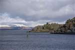 Dunollie Castle and the snowy mountains of Morvern