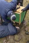 Fixing the owl box to the pole, Black Devon Wetlands
