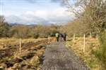 People using the new path to the shore of Loch Lomond
