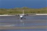Barra Airport - Twin Otter landing on the beach